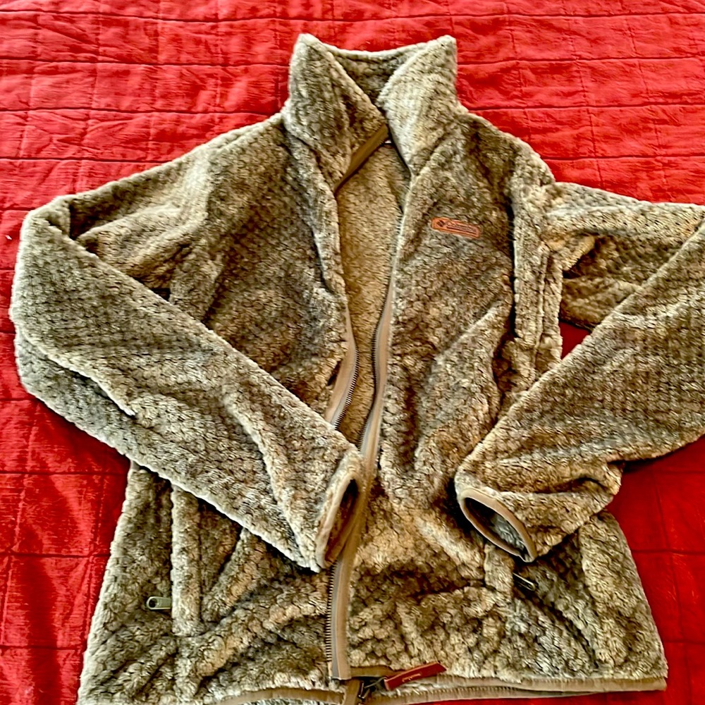 Green Columbia jacket brand new and only warm once. Size small. No tears at all